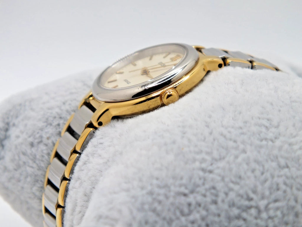 Seiko Avenue 1F21-0H50 ladies’ quartz two-tone watch with gold accents, silver hour markers, and linked metal band.